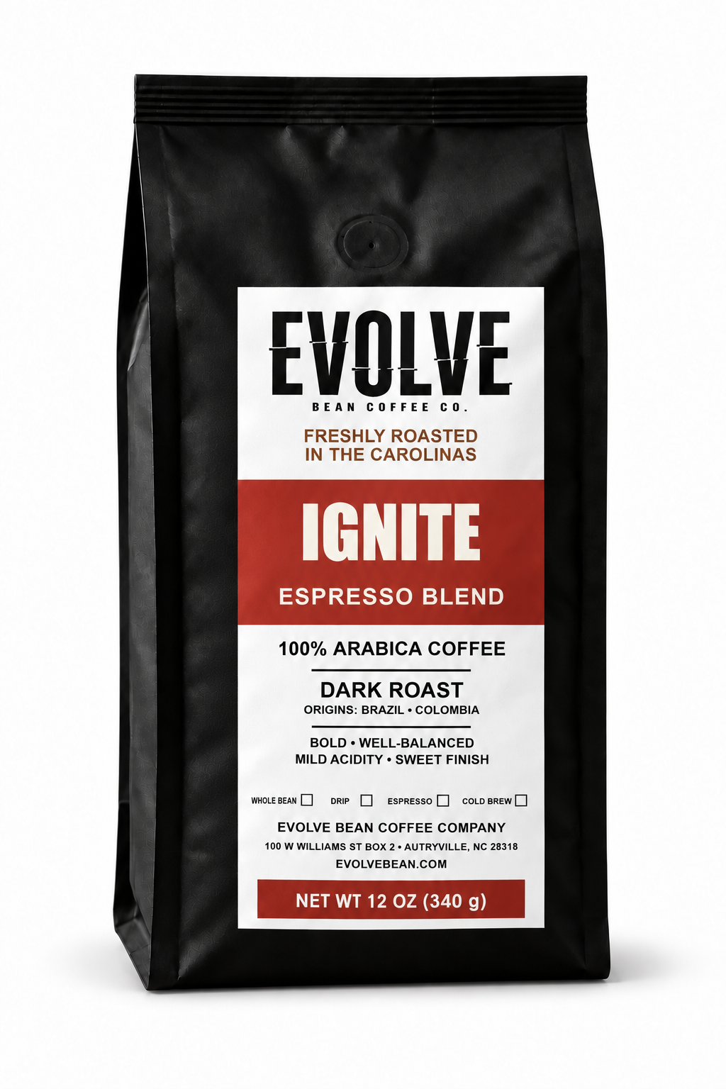 A 12 oz black bag of Evolve Bean Coffee Company's Ignite Espresso Blend dark roast coffee, featuring a white and red label on a white background.